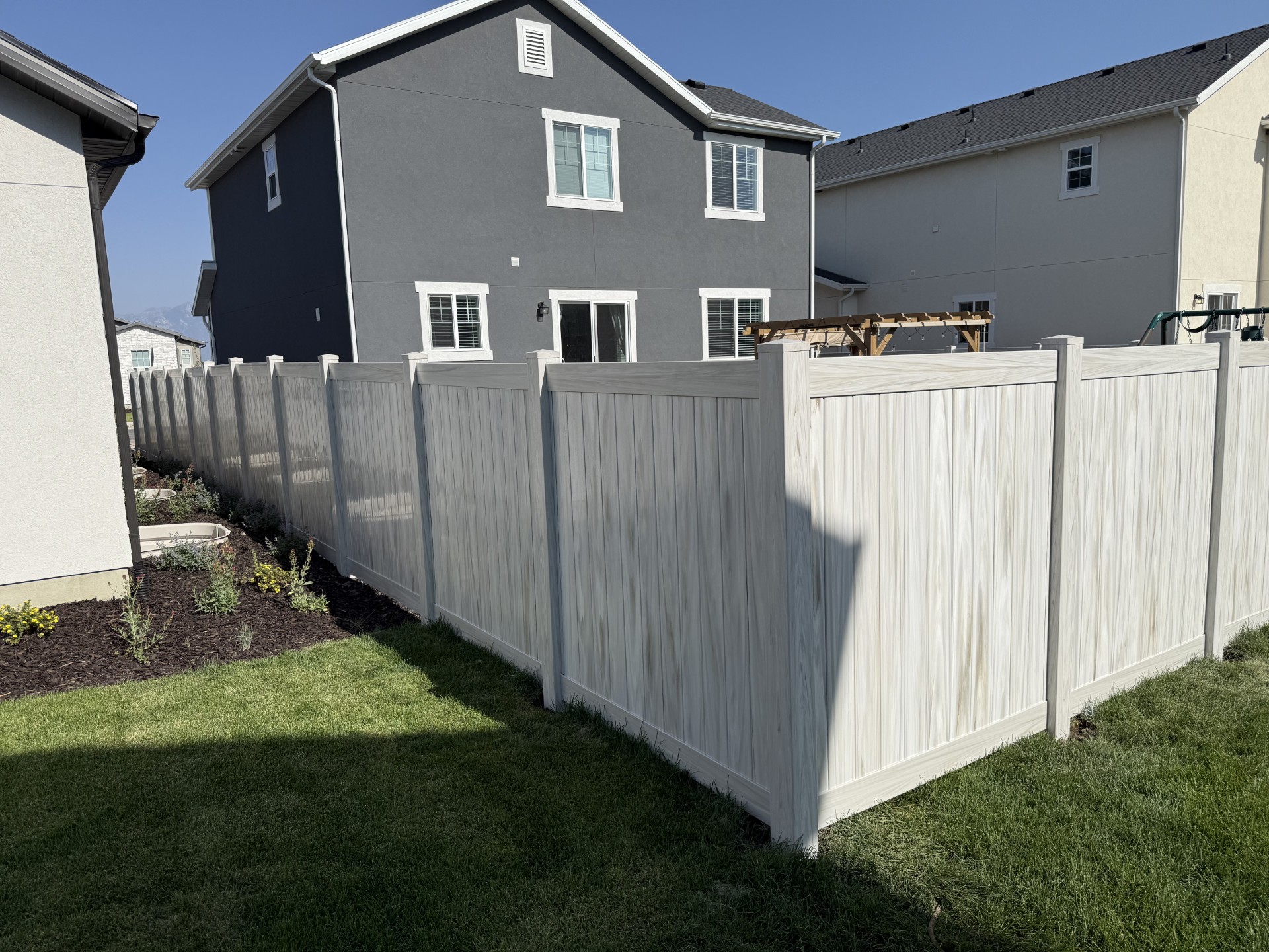 Vinyl privacy fence installed by Spacemakers Fence in Utah